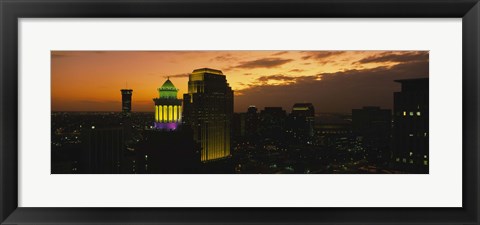 Framed High angle view of buildings lit up at dusk, New Orleans, Louisiana, USA Print