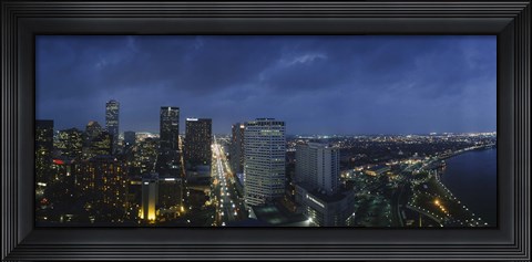 Framed High angle view of buildings in a city lit up at night, New Orleans, Louisiana, USA Print