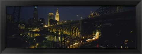 Framed Arch bridge and buildings lit up at night, Cleveland, Ohio, USA Print