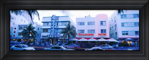 Framed Traffic on road in front of hotels, Ocean Drive, Miami, Florida, USA Print