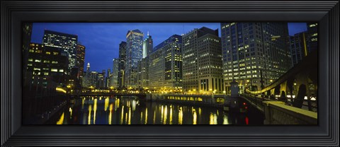 Framed Low angle view of buildings lit up at night, Chicago River, Chicago, Illinois, USA Print