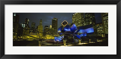 Framed Low angle view of buildings lit up at night, Pritzker Pavilion, Millennium Park, Chicago, Illinois, USA Print