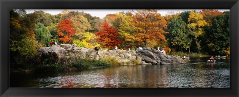 Framed Group of people sitting on rocks, Central Park, Manhattan, New York City, New York, USA Print