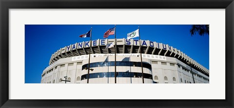 Framed Flags in front of a stadium, Yankee Stadium, New York City Print