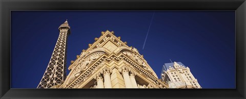 Framed Low angle view of a building in front of a replica of the Eiffel Tower, Paris Hotel, Las Vegas, Nevada, USA Print
