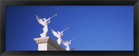 Framed Low angle view of statues on a wall, Caesars Place, Las Vegas, Nevada, USA Print