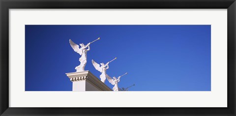 Framed Low angle view of statues on a wall, Caesars Place, Las Vegas, Nevada, USA Print