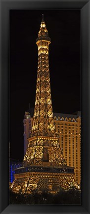 Framed Replica of the Eiffel Tower lit up at night, Paris Las Vegas, Las Vegas, Nevada, USA Print