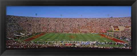 Framed High angle view of a football stadium full of spectators, Los Angeles Memorial Coliseum, City of Los Angeles, California, USA Print