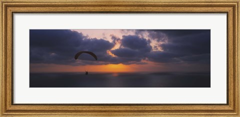 Framed Silhouette of a person paragliding over the sea, Blacks Beach, San Diego, California, USA Print
