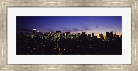 Framed Skyscrapers in a city lit up at night, Manhattan, New York City, New York State, USA Print