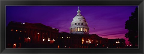 Framed Low angle view of a government building lit up at twilight, Capitol Building, Washington DC, USA Print