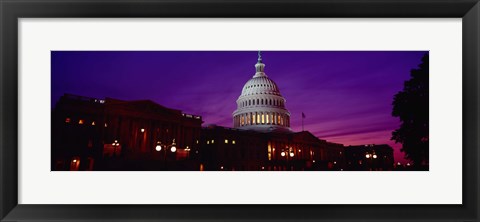 Framed Low angle view of a government building lit up at twilight, Capitol Building, Washington DC, USA Print