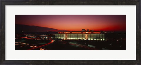 Framed High angle view of a building lit up at night, John F. Kennedy Center for the Performing Arts, Washington DC, USA Print