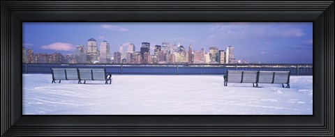 Framed Park benches in snow with a city in the background, Lower Manhattan, Manhattan, New York City, New York State, USA Print