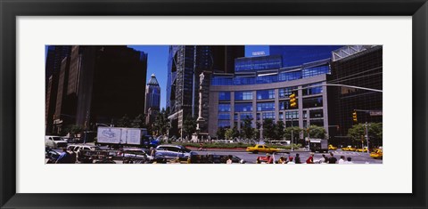 Framed Traffic on the road in front of buildings, Columbus Circle, Manhattan, New York City, New York State, USA Print