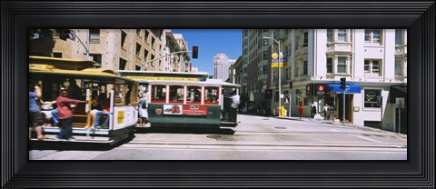 Framed Two cable cars on a road, Downtown, San Francisco, California, USA Print