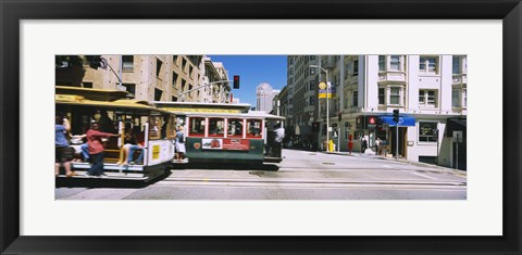 Framed Two cable cars on a road, Downtown, San Francisco, California, USA Print