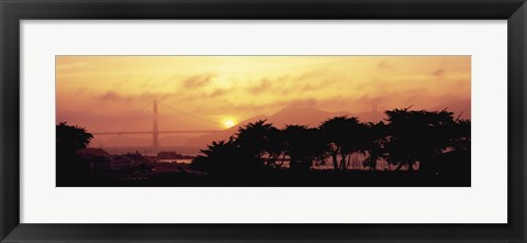 Framed Silhouette of trees at dusk with a bridge in the background, Golden Gate Bridge, San Francisco, California, USA Print