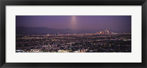 Framed Buildings in a city lit up at dusk, Hollywood, San Gabriel Mountains, City Of Los Angeles, Los Angeles County, California, USA Print