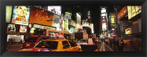 Framed Buildings lit up at night in a city, Broadway, Times Square, Midtown Manhattan, Manhattan, New York City, New York State, USA Print