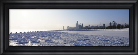 Framed Frozen lake with a city in the background, Lake Michigan, Chicago, Illinois Print
