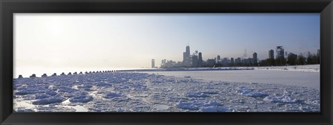 Framed Frozen lake with a city in the background, Lake Michigan, Chicago, Illinois Print