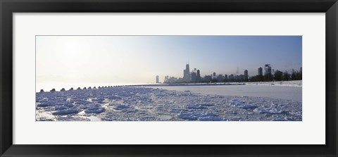 Framed Frozen lake with a city in the background, Lake Michigan, Chicago, Illinois Print