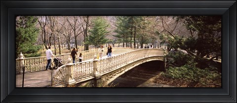 Framed Group of people walking on an arch bridge, Central Park, Manhattan, New York City, New York State, USA Print