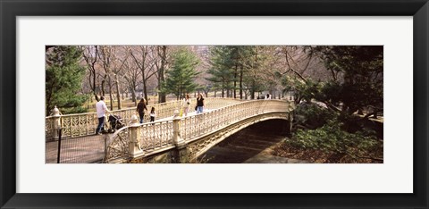 Framed Group of people walking on an arch bridge, Central Park, Manhattan, New York City, New York State, USA Print