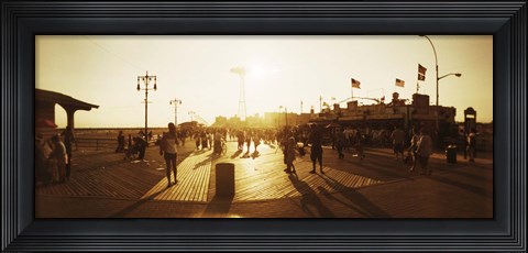Framed Tourists walking on a boardwalk, Coney Island Boardwalk, Coney Island, Brooklyn, New York City, New York State, USA Print