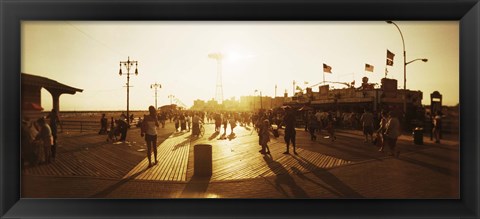 Framed Tourists walking on a boardwalk, Coney Island Boardwalk, Coney Island, Brooklyn, New York City, New York State, USA Print