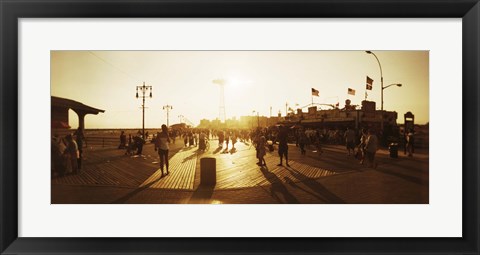 Framed Tourists walking on a boardwalk, Coney Island Boardwalk, Coney Island, Brooklyn, New York City, New York State, USA Print