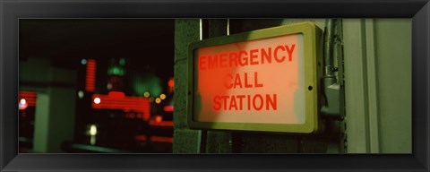 Framed Emergency telephone booth in a city, California, USA Print