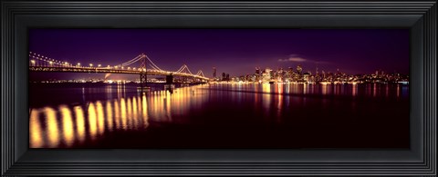 Framed Bridge lit up at night, Bay Bridge, San Francisco Bay, San Francisco, California Print