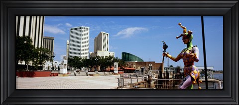 Framed Jester statue with buildings in the background, Riverwalk Area, New Orleans, Louisiana, USA Print