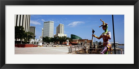 Framed Jester statue with buildings in the background, Riverwalk Area, New Orleans, Louisiana, USA Print