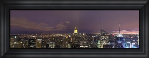 Framed Buildings in a city lit up at dusk, Midtown Manhattan, Manhattan, New York City, New York State, USA Print