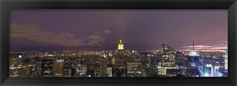 Framed Buildings in a city lit up at dusk, Midtown Manhattan, Manhattan, New York City, New York State, USA Print