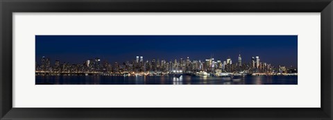 Framed Buildings in a city lit up at dusk, Hudson River, Midtown Manhattan, Manhattan, New York City, New York State, USA Print