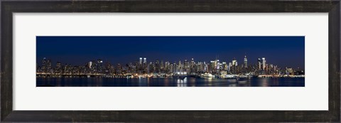 Framed Buildings in a city lit up at dusk, Hudson River, Midtown Manhattan, Manhattan, New York City, New York State, USA Print