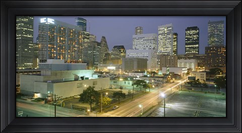 Framed Skyscrapers lit up at night, Houston, Texas Print