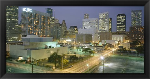 Framed Skyscrapers lit up at night, Houston, Texas Print