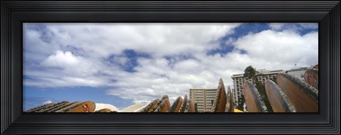 Framed Low angle view of skyscrapers and surfboards, Honolulu, Oahu, Hawaii, USA Print