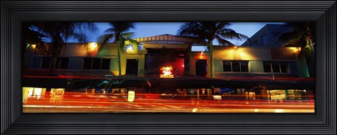 Framed Traffic in front of a building at dusk, Art Deco District, South Beach, Miami Beach, Miami-Dade County, Florida, USA Print