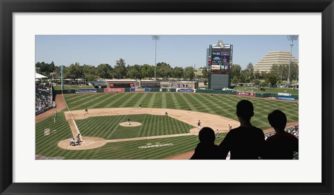 Framed Spectator watching a baseball match at stadium, Raley Field, West Sacramento, Yolo County, California, USA Print