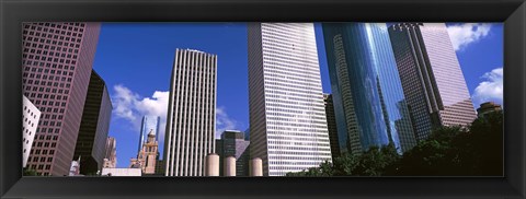 Framed Low angle view of buildings, Wedge Tower, Continental Airlines Tower, ExxonMobil Building, Chevron Building, Houston, Texas, USA Print