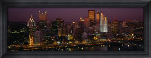 Framed High angle view of buildings lit up at night, Pittsburgh, Pennsylvania, USA Print