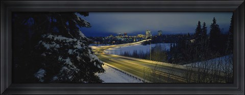 Framed Winding road running through a snow covered landscape, Anchorage, Alaska, USA Print