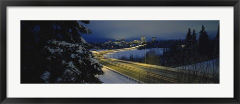 Framed Winding road running through a snow covered landscape, Anchorage, Alaska, USA Print